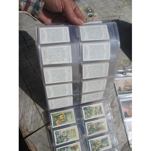 424 - Variety of loose cigarette cards and some fixed in albums