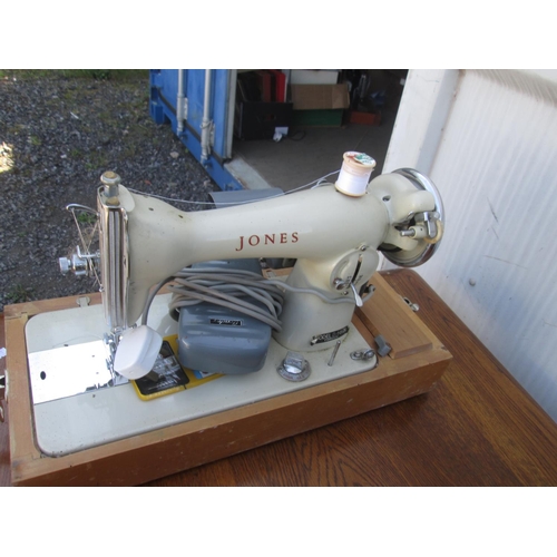 38 - Vintage Jones sewing machine with treadle