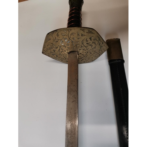 215 - Early 20th century Indian dress sword in metal and leather scabbard, etched blade made in India, no ... 