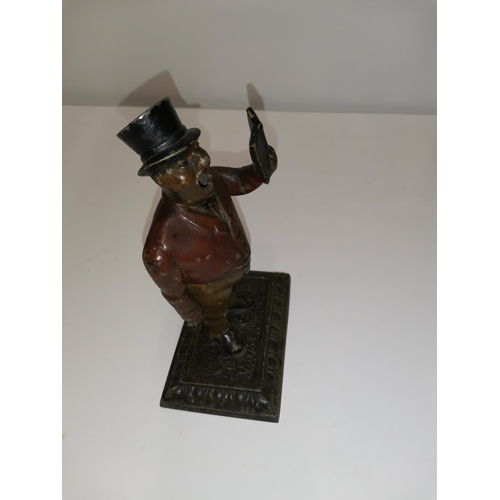 281 - Scarce early 20th century cast spelter cold painted cigar cutter modelled as a Town Crier, arm drop ... 