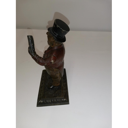 281 - Scarce early 20th century cast spelter cold painted cigar cutter modelled as a Town Crier, arm drop ... 