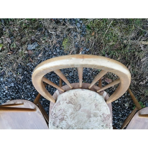 1 - Set of four Ercol Stick back light coloured dining chairs