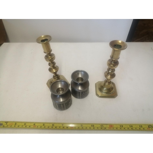 7 - Brass and pewter candlesticks