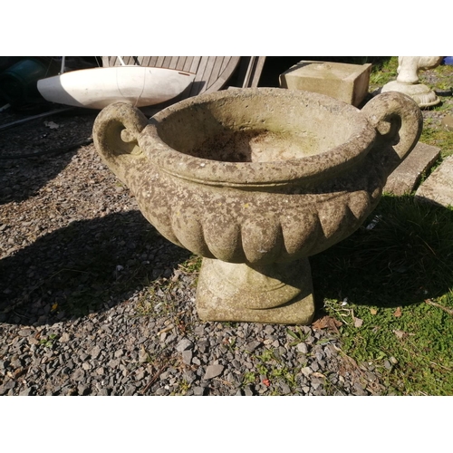 19 - Pair of composite stone garden squat two handled urns 40 cms x 60 cms wide