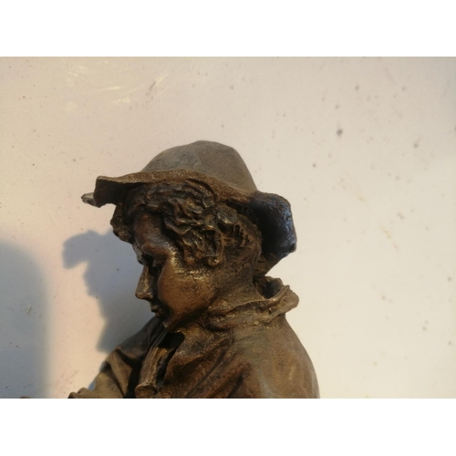 95 - Bronzed metal figure of a boy, note damage