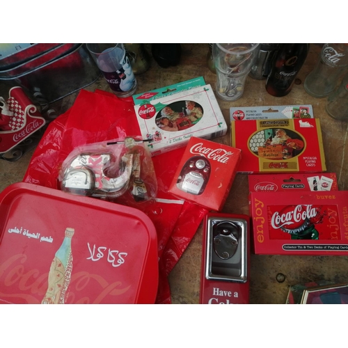 215 - Coca Cola Advertising Collectables : various including bottles empty and full, boxed pencil sharpene... 