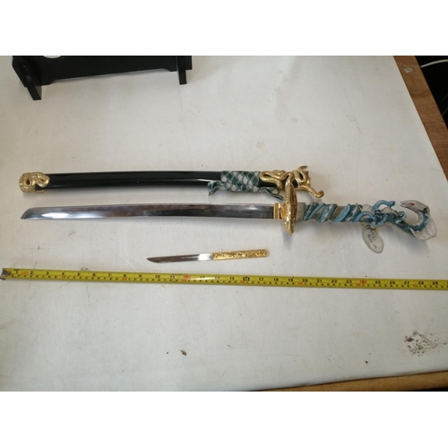 253 - Modern Wakizashi style sword  dagger with scabbard on stand