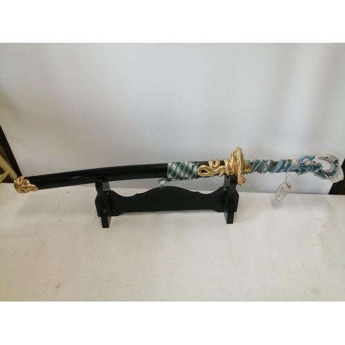 253 - Modern Wakizashi style sword  dagger with scabbard on stand