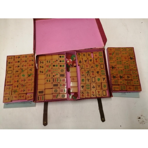 293 - Vintage Mahjong set with resin pieces and instructions