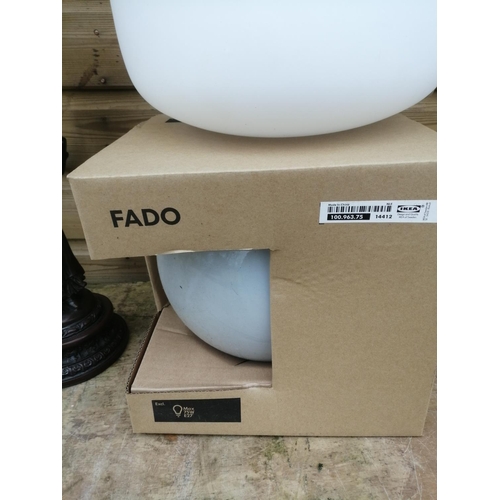 295 - Ikea boxed Fado lamp and one loose & resin table lamp modelled as a girl