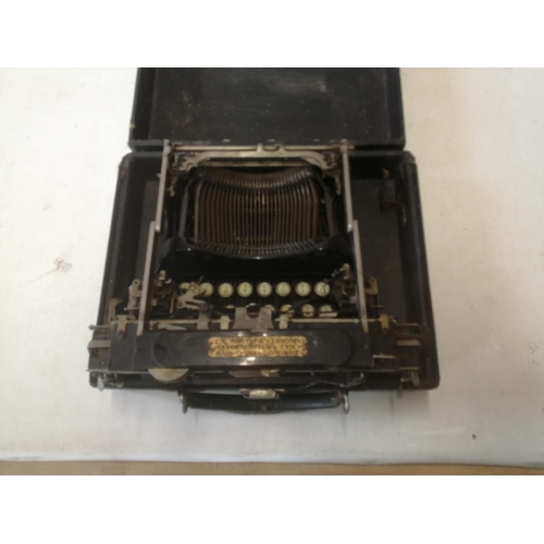 366 - Vintage Smiths Corona portable typewriter in hardboard case, note case damage