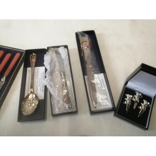 378 - Silver plated cutlery in presentation boxes including P & O Posh club letter opener