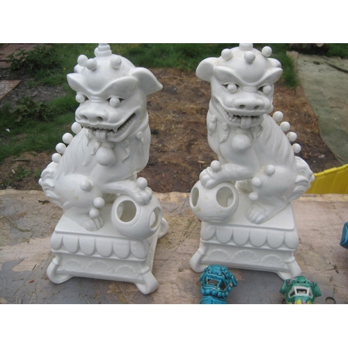 440 - Various Chinese ceramic Foo Dog ornaments, note some damages