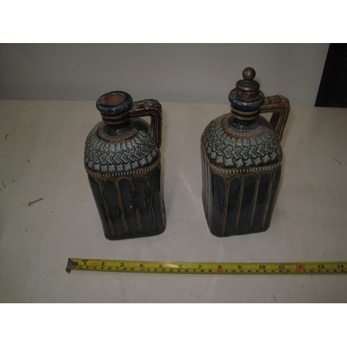 443 - Pair of Victorian Doulton stoneware flagons, intialled EM underneath in good order