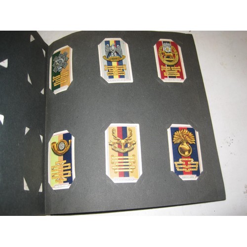 493 - Assorted albums of Commemorative issue cigarette cards by major manufacturers fixed in albums, loose... 