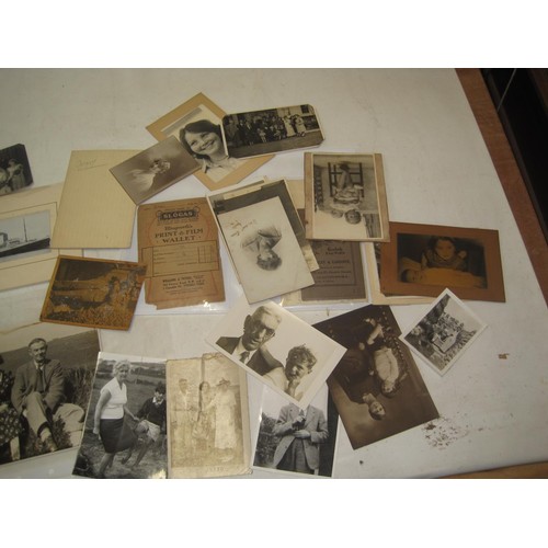 494 - An aray of black and white photographs dating from late 19th - mid 20th century, family snaps, men i... 