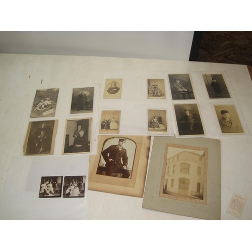 494 - An aray of black and white photographs dating from late 19th - mid 20th century, family snaps, men i... 