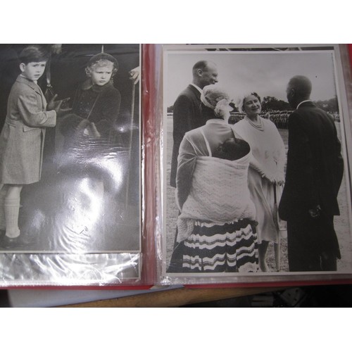 500 - 2 x albums of black and white photographs of the royal family dating from 1945 onwards, varying size... 