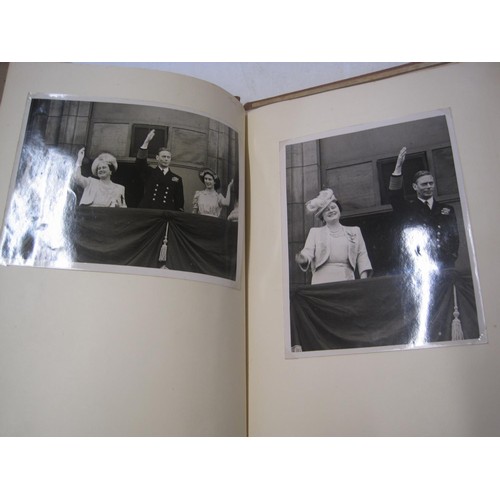 500 - 2 x albums of black and white photographs of the royal family dating from 1945 onwards, varying size... 