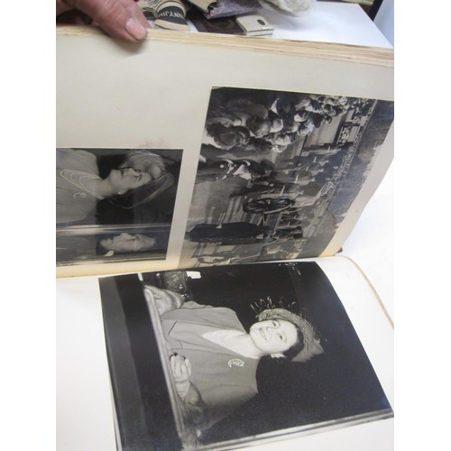 500 - 2 x albums of black and white photographs of the royal family dating from 1945 onwards, varying size... 