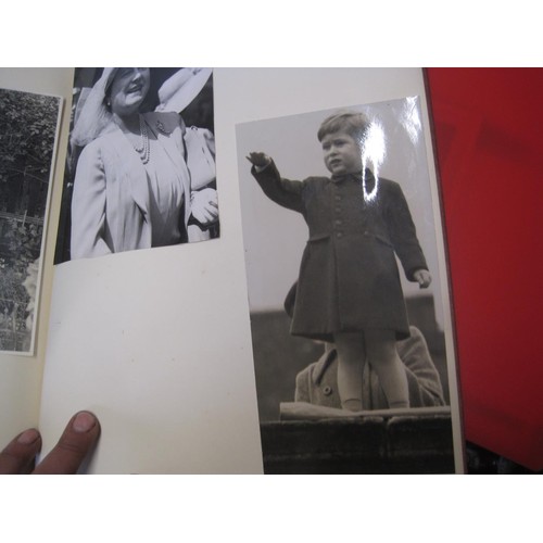 500 - 2 x albums of black and white photographs of the royal family dating from 1945 onwards, varying size... 