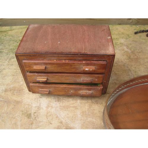 511 - Box of oddments : copperware, miniature chest of drawers, hip flask etc.