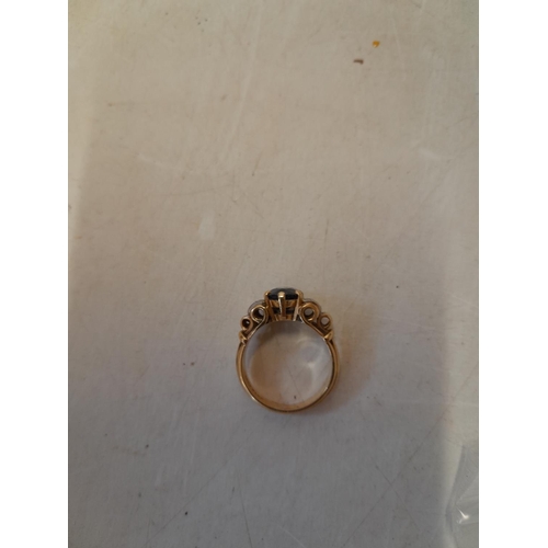 522 - 18 ct gold ring set with sapphire and small diamonds, some flaking to sapphire size M, 7 g