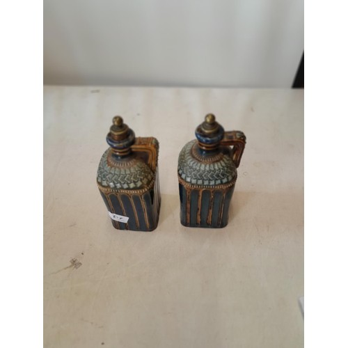 443 - Pair of Victorian Doulton stoneware flagons, intialled EM underneath in good order