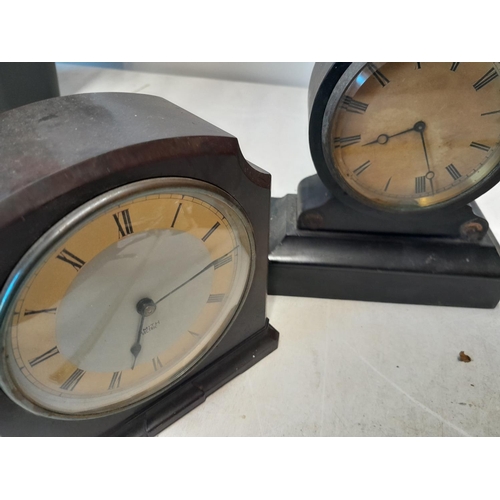 83 - 4 x vintage clocks : bakelite case good movement needs work