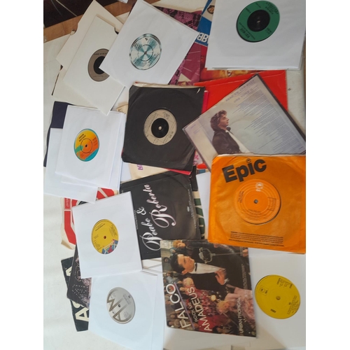 98 - 45's  single vinyl records in carry case  : 60's - 90' commercial pop, lots of ABBA on Epic