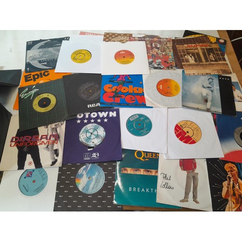 104 - 45's  single vinyl records in carry case 60's - 90' commercial pop