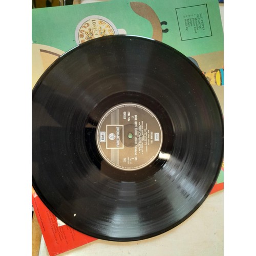 117 - Various Beatles related vinyl records : 1 x Sgt. Peppers with insert and in fair to good condition, ... 