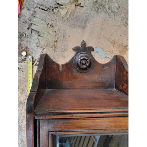 156 - Edwardian mahogany cabinet with bevelled glass front, note light split