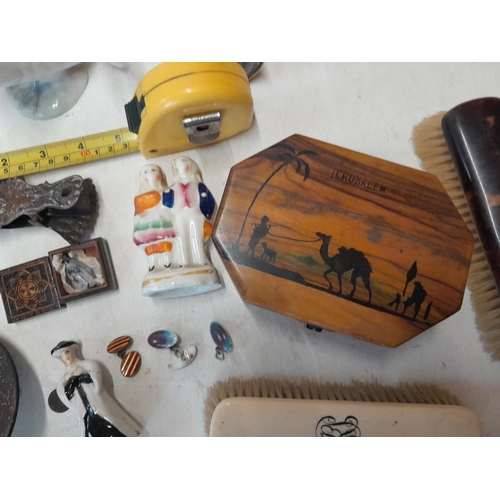 205 - Box of oddments : 19th century Staffordshire figure, olive wood box, Damaged Ruskin style cuff links... 