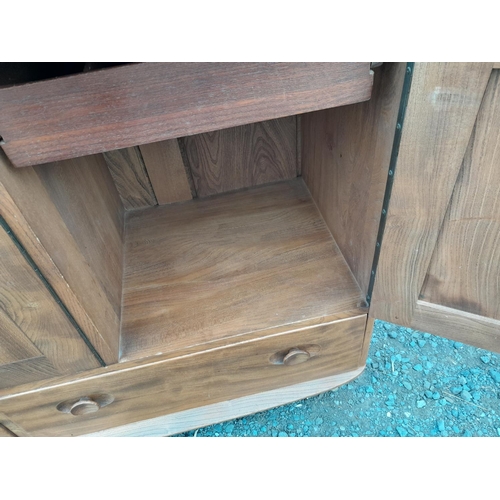 222 - Ercol sideboard, in good condition light staining in places