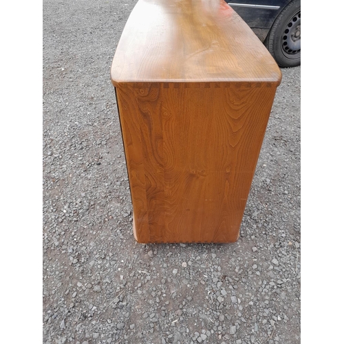 222 - Ercol sideboard, in good condition light staining in places