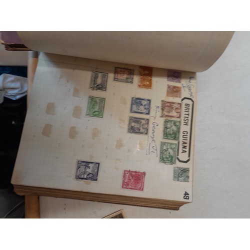 274 - Partially filled used stamp collection, Stamps of the World, sparsely filled stock book and sparsely... 