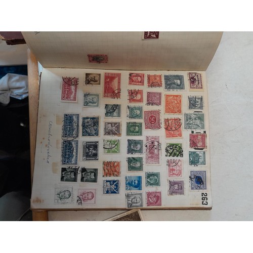 274 - Partially filled used stamp collection, Stamps of the World, sparsely filled stock book and sparsely... 