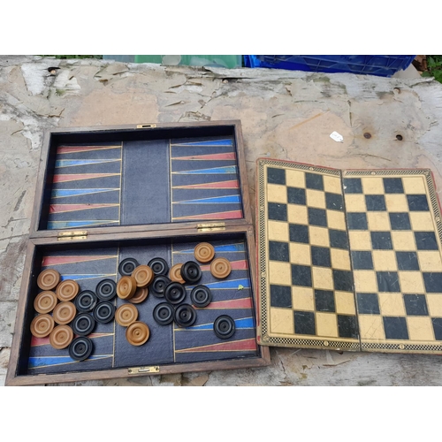 349 - Early 20th century inlaid mahogany games box opening to reveal leather lined interior for back gammo... 