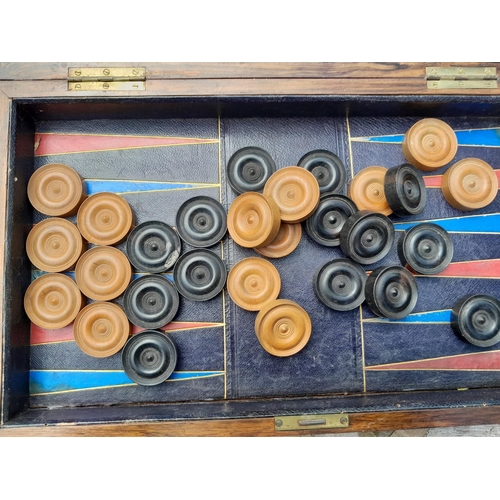 349 - Early 20th century inlaid mahogany games box opening to reveal leather lined interior for back gammo... 