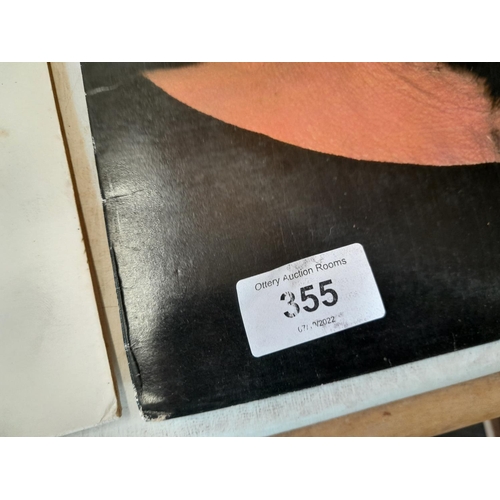 355 - Vinyl record albums : Lynard Skynard, Kate Bush and others