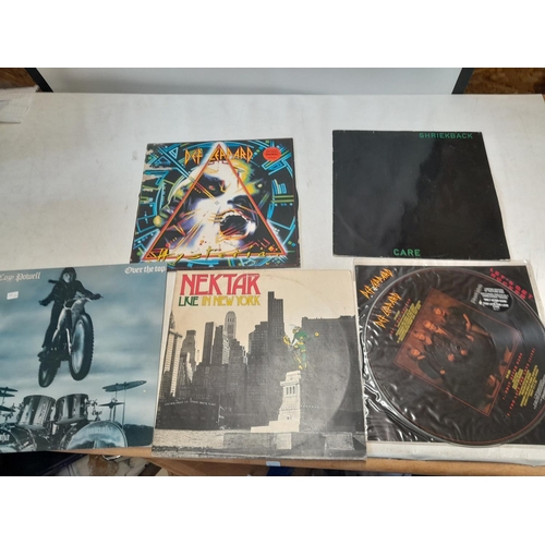 379 - Vinyl record albums : Deff Leppard picture disc, Whitesnake, Care, Cozy Powell and others