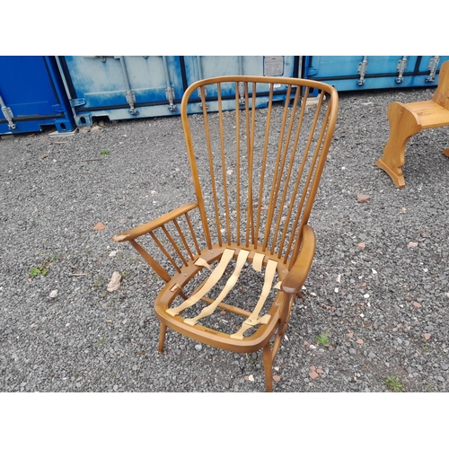 3 - Vintage Ercol stick back easy chair in need of restoration, worn on arms, sticks are strong, webbing... 