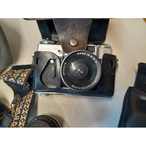 40 - Assorted cameras : Praktica MTL 50 with Zeiss macro lens & padded case, Zenit in leather case, Helio... 