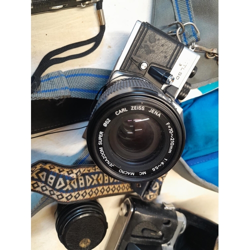 40 - Assorted cameras : Praktica MTL 50 with Zeiss macro lens & padded case, Zenit in leather case, Helio... 