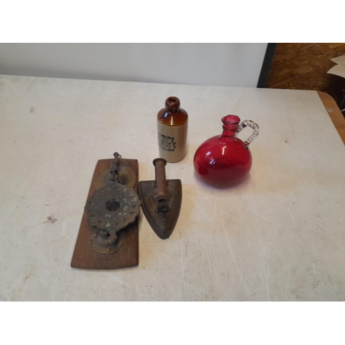 50 - Antique Middle Eastern door knocker on later mount, flat iron Cranberry glass jug etc.