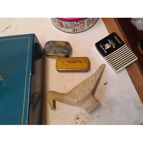 51 - toys and games, lion door knocker,  advertising tins, Berber style soapstone bird etc.