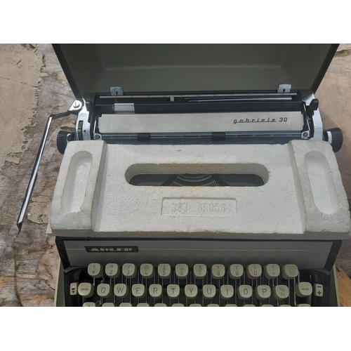 96 - Vintage Adler Gabrielle typewriter in plastic case