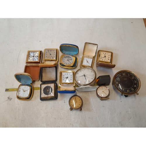 304 - Assorted travelling alarm clocks , spares and repairs