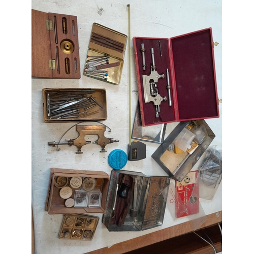 306 - assorted watch repair items and spares etc.